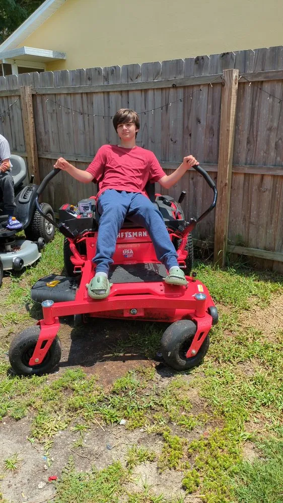 Professional yard maintenance with custom design in Spring Hill, FL by Frank and Sons Lawn Care