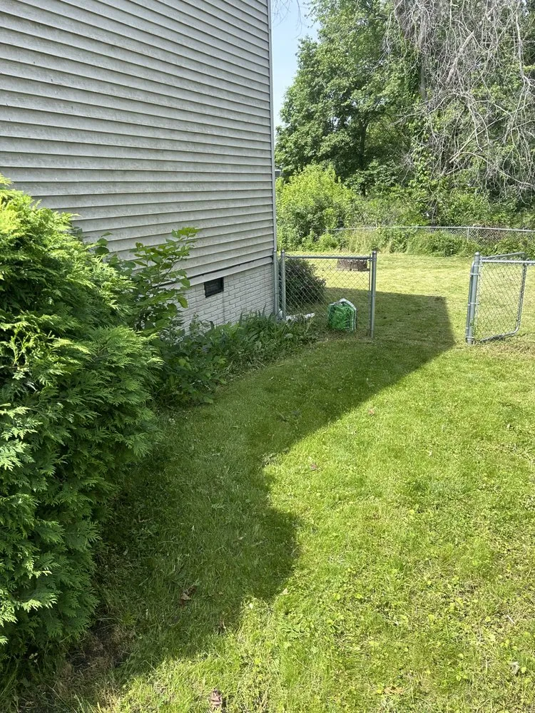 Professional lawn mowing service in Iowa City, IA by Franklin Property Maintenance