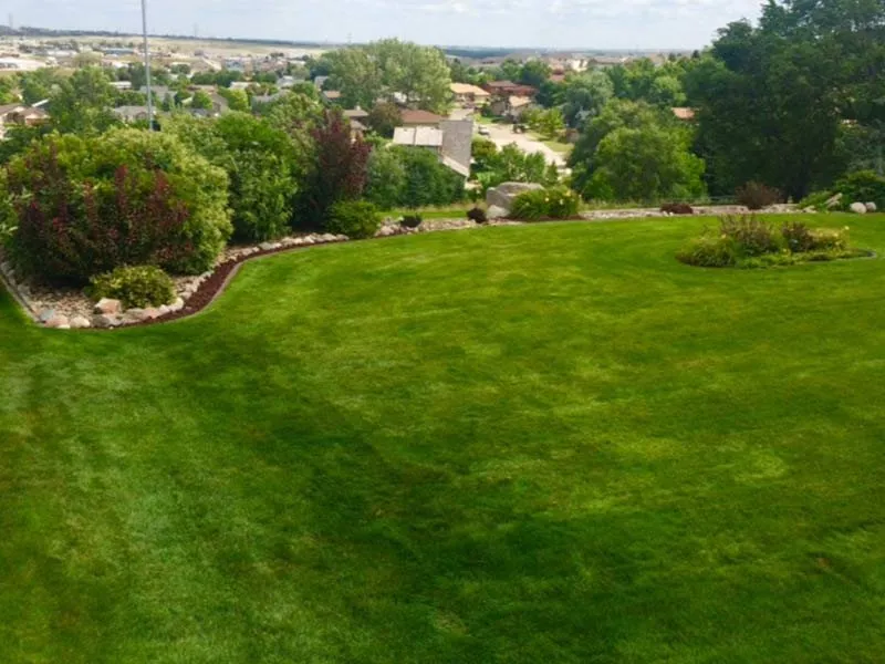 Custom lawn mowing service for homes in Bismarck, ND by Franks Lawn Service