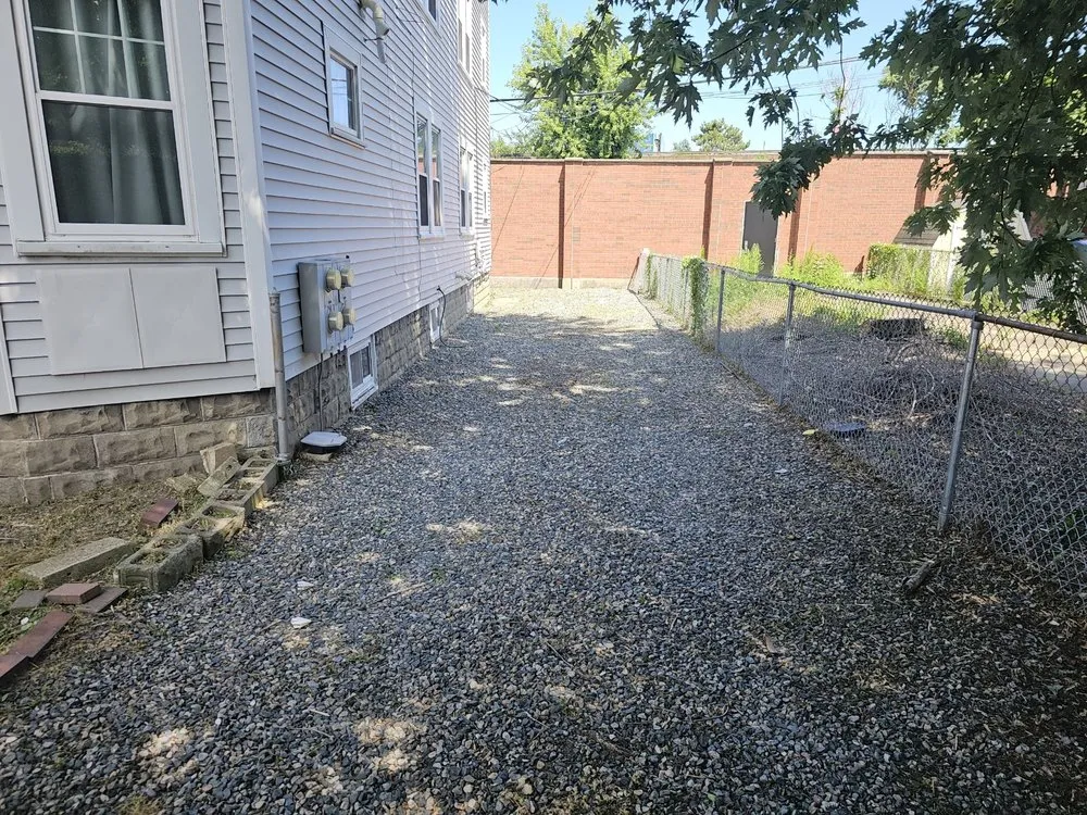 Custom landscape installation in Millis, MA - Freddy & Sons Landscape and Handyman