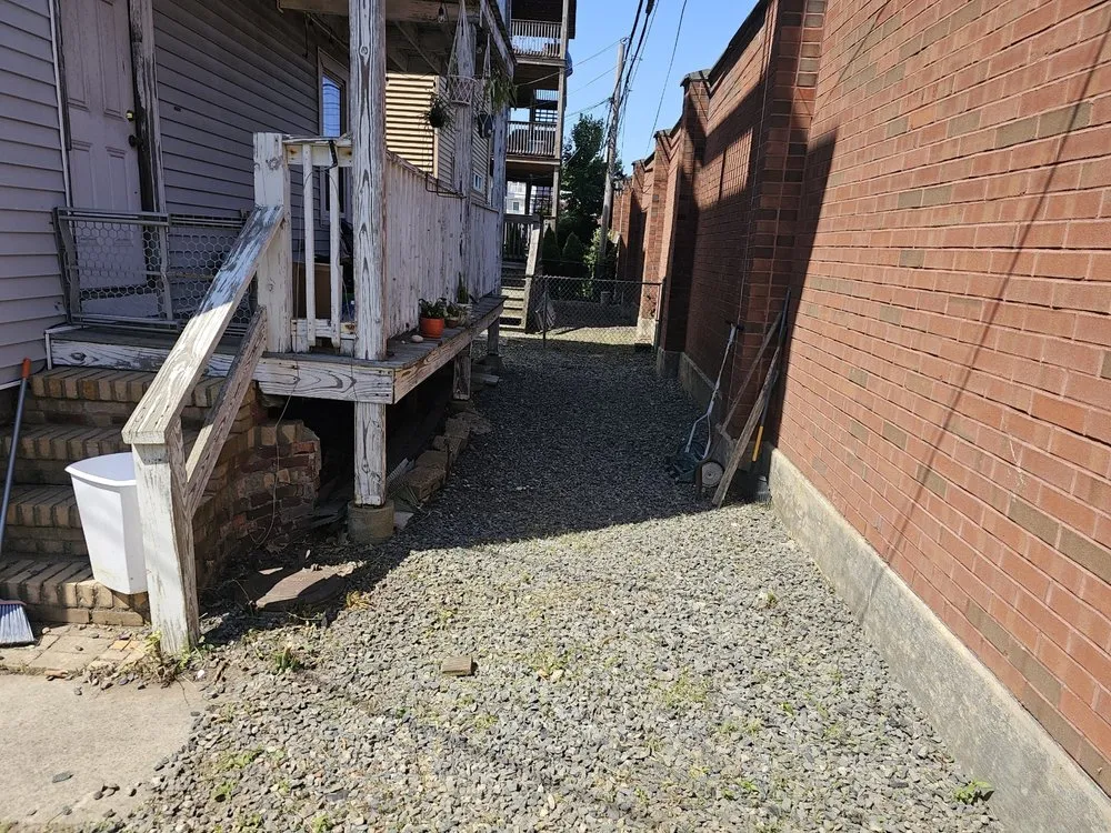 Expert outdoor landscaping with custom design across Millis, MA - Freddy & Sons Landscape and Handyman