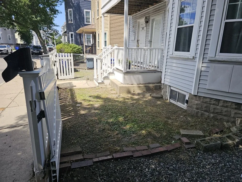 Local lawn care service with custom design in Millis, MA by Freddy & Sons Landscape and Handyman