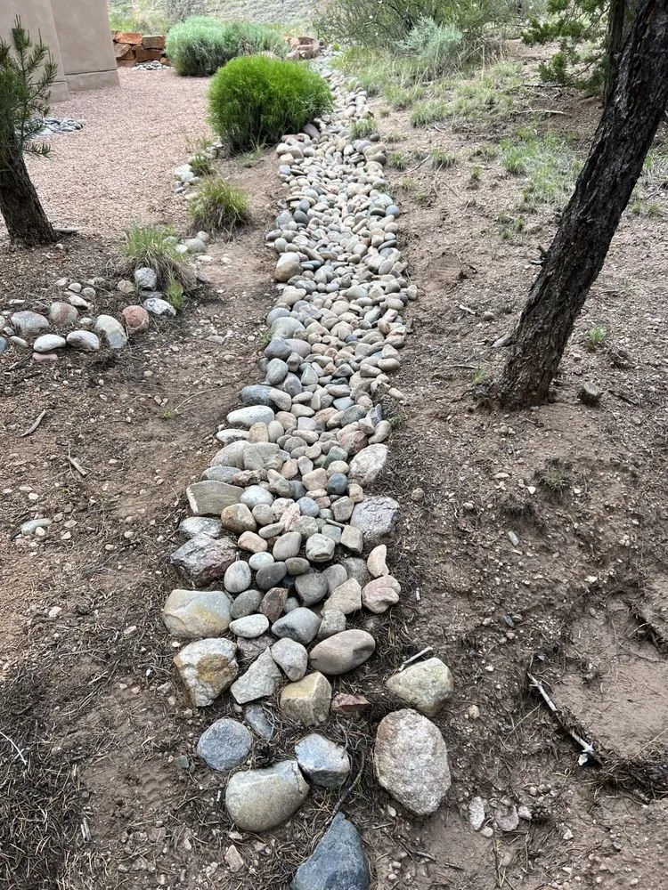 Custom landscape installation for residential properties in Albuquerque, NM by Freddy's Home Landscaping and Fence Services