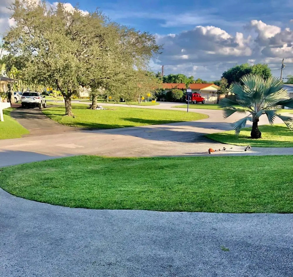 Custom landscape installation for year-round maintenance in Miami, FL by Freddy’s Lawn Maintenance