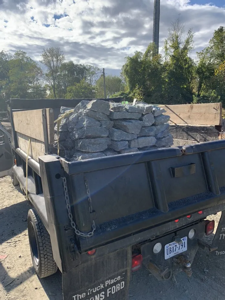 Custom lawn mowing service with custom design in Annandale, VA by Fredys Hauling