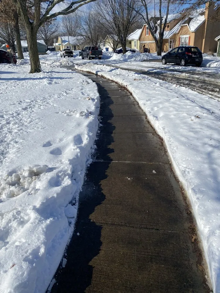 Professional lawn care service in Topeka, KS by Free State Gutter Cleaning