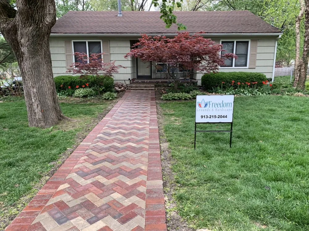Reliable landscape installation for year-round maintenance in Blue Springs, MO by Freedom Grounds and Hardscape