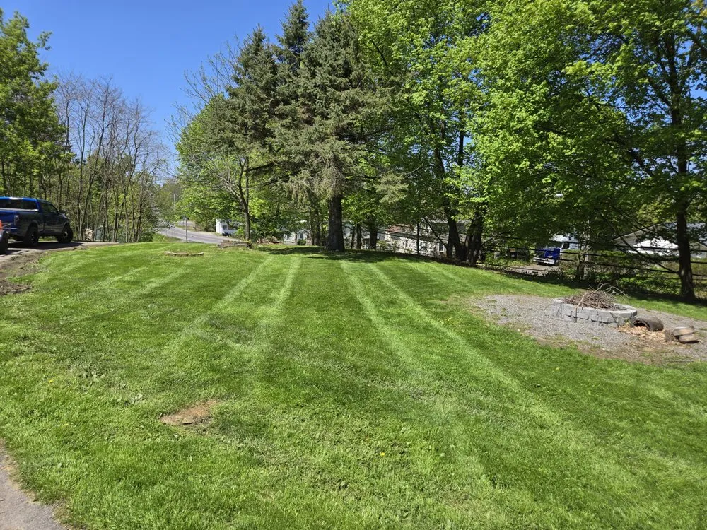 Top-rated garden landscaping for beautiful yards in Oswego, NY by Freedom Lawn and Home Services