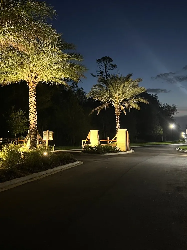 Local garden landscaping with custom design in Middleburg, FL by Freedom Lawn Care & Tractor Services