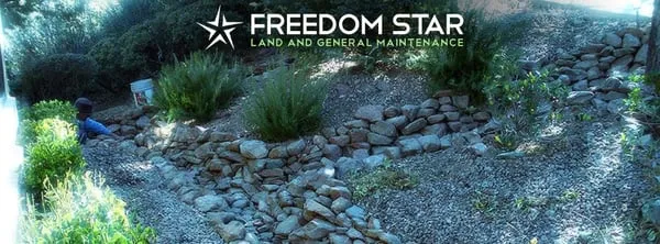 Freedom Star Land and General Maintenance Logo