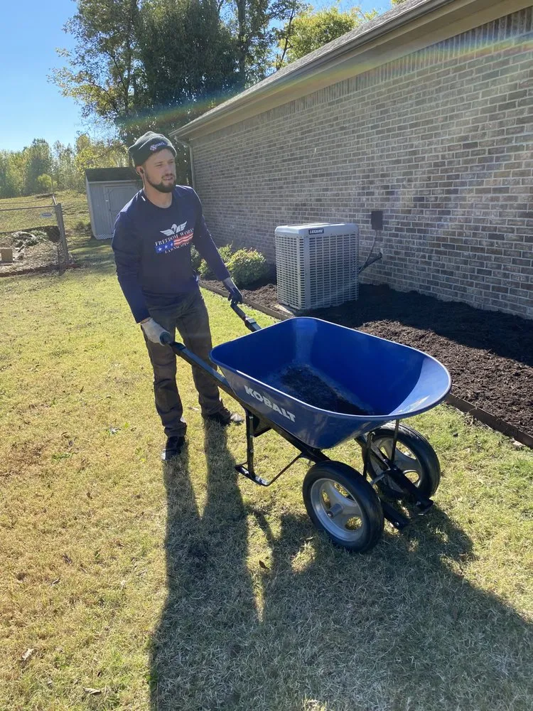 Reliable lawn care service for homes in Newbern, TN by Freedom Works Lawnscaping