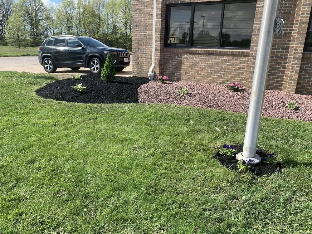Custom yard cleanup service for outdoor upgrades in Cortland, OH by Freeman Landscaping and Snow Removal