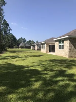 Freeport Lawn Care Logo