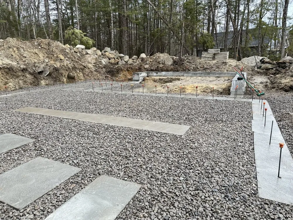 Professional yard cleanup service for residential properties in Loudon, NH by Frenette Farm