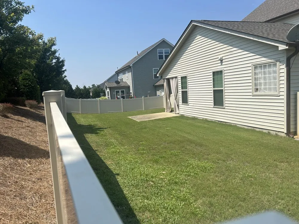 Professional yard cleanup service for residential properties in Four Oaks, NC by Fresh Cut