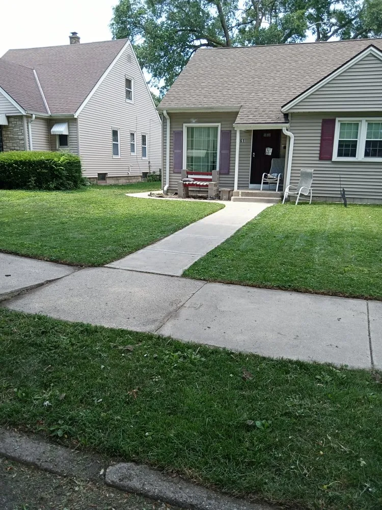 Professional yard maintenance with custom design in Milwaukee, WI by Fresh Cutz Lawn Service