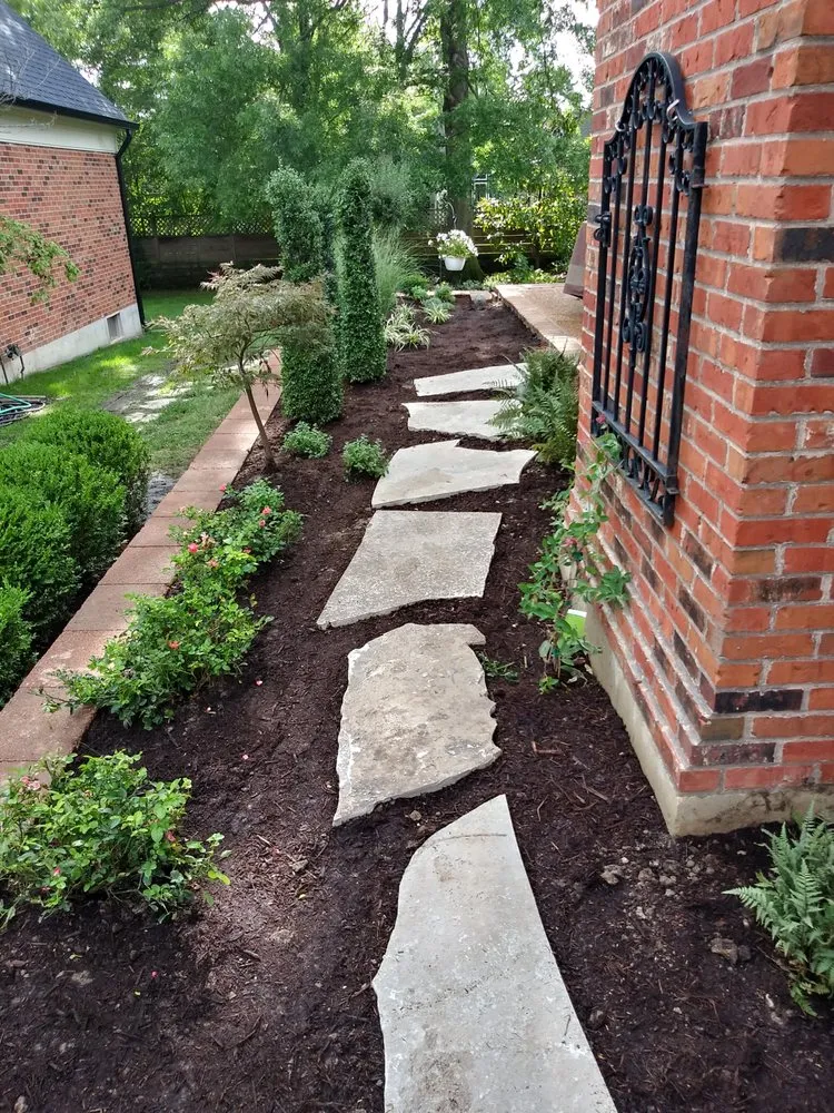 Local lawn mowing service with custom design in St. Louis, MO by Fresh Start Outdoors