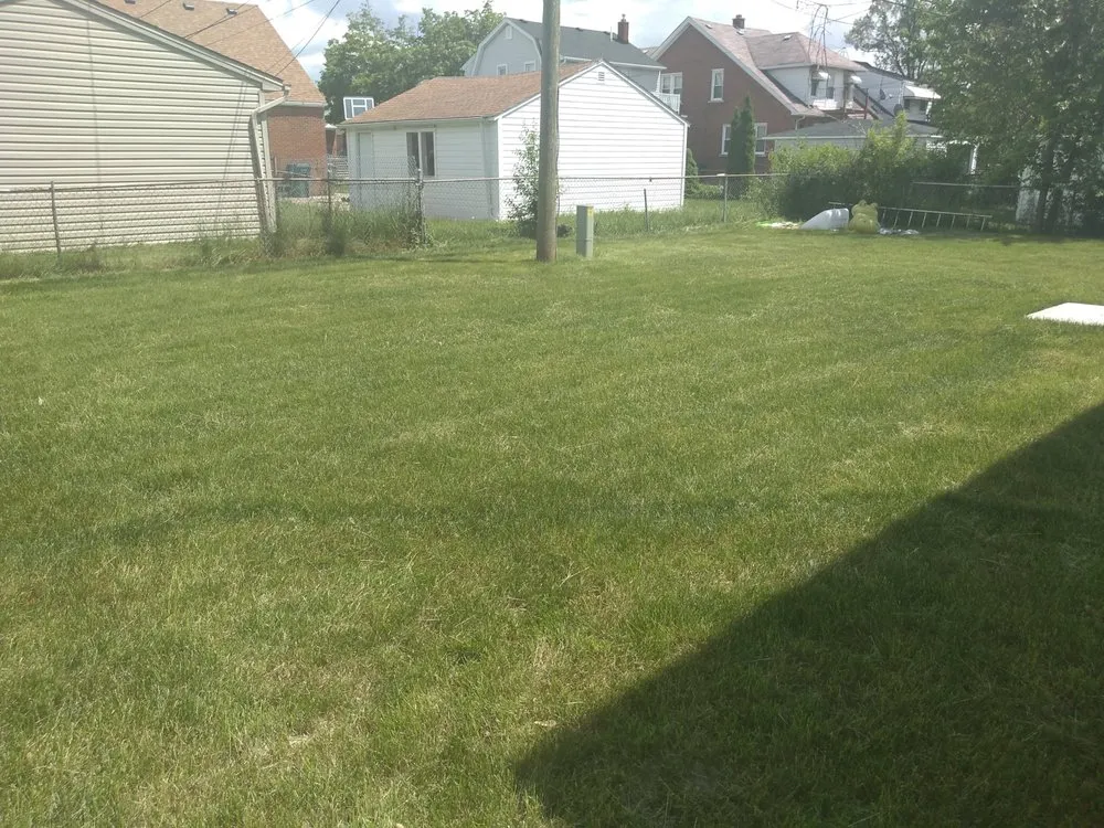 Custom lawn mowing service for residential properties in Detroit, MI by Freshly Made Cuts