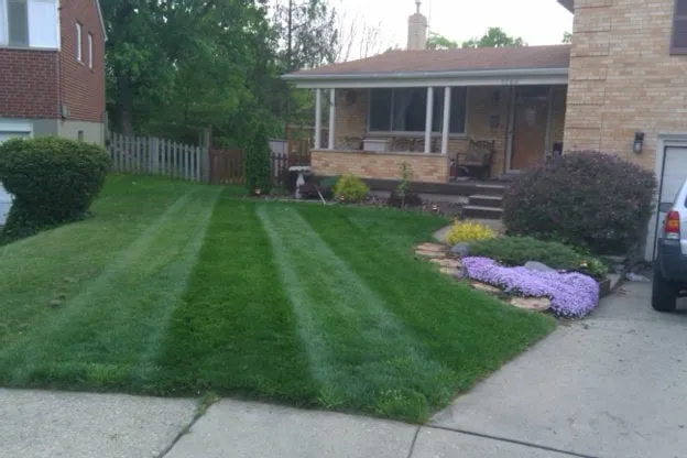 Custom landscape installation in Madison, IN by Frey Lawn Care