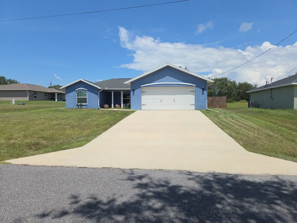 Affordable lawn mowing service for residential properties in Ocala, FL by Frog Town Lawn Care and Handyman Services