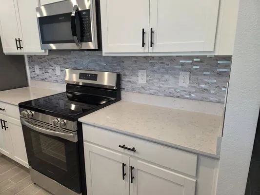 Frog Town Lawn Care and Handyman Services Logo