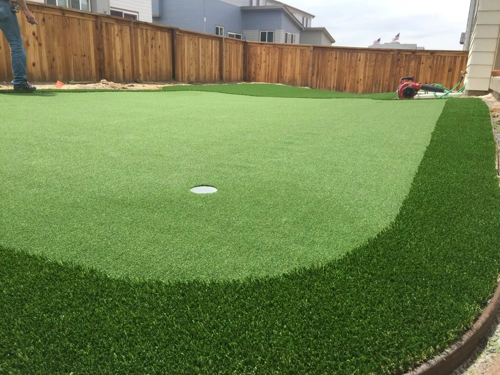 Custom landscape installation for year-round maintenance in Henderson, CO by Frontier Turf