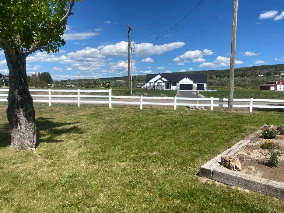 Professional residential landscaping in Idaho Falls, ID - Full Curl Fence and Landscape