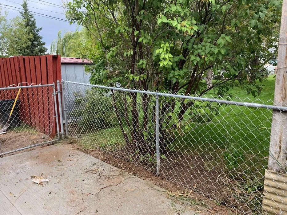 Custom outdoor landscaping for beautiful yards across Idaho Falls, ID - Full Curl Fence and Landscape
