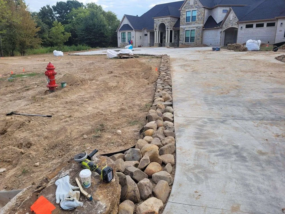 Custom landscape installation for homes in Greenville, TX by Fuller's Lawn Service