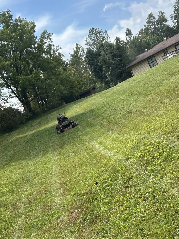Affordable yard cleanup service for homes in Old Fort, NC by Fully Involved Lawn Care and Landscaping