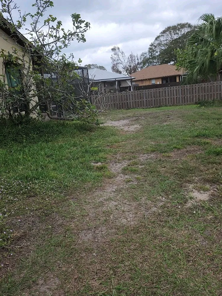 Custom landscape design for beautiful yards in Palm Bay, FL by Fully Loaded Lawn and Landscaping