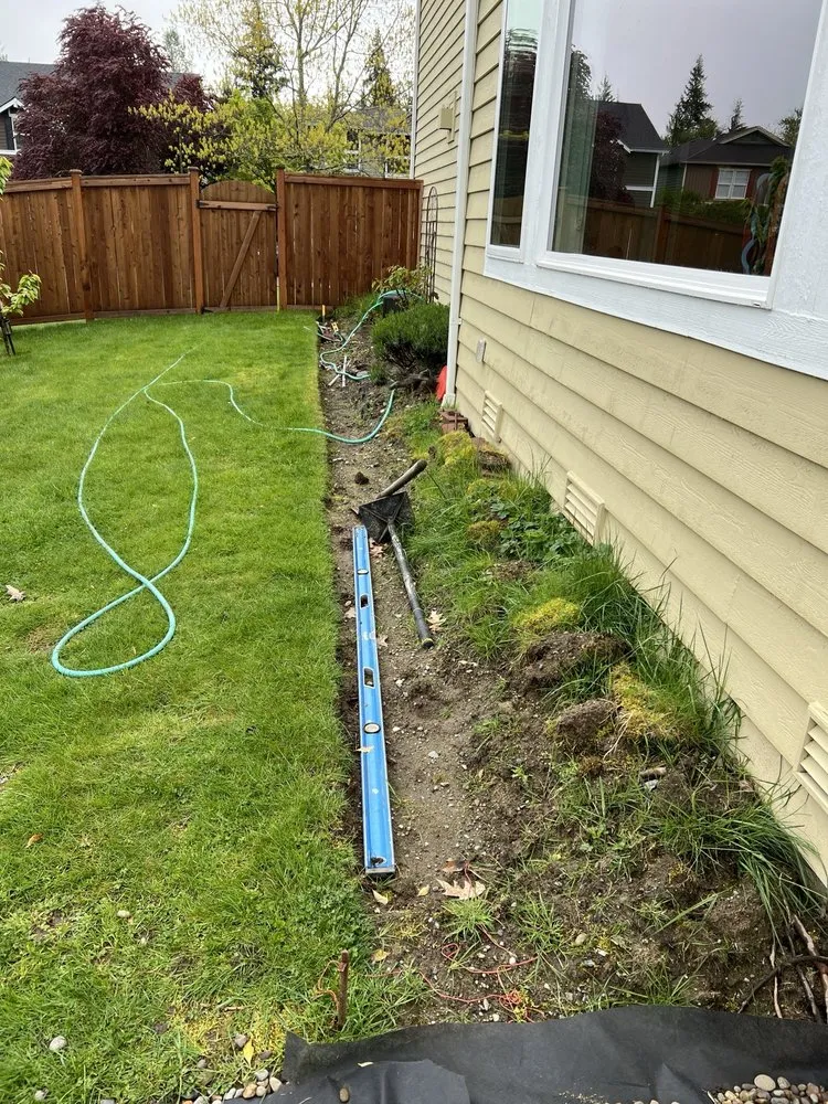 Local lawn care service for year-round maintenance in Seattle, WA by Fusion Concrete