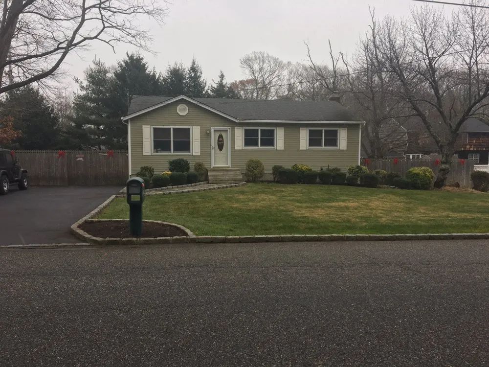 Custom lawn mowing service for year-round maintenance in Port Jefferson Station, NY by G & E Landscaping