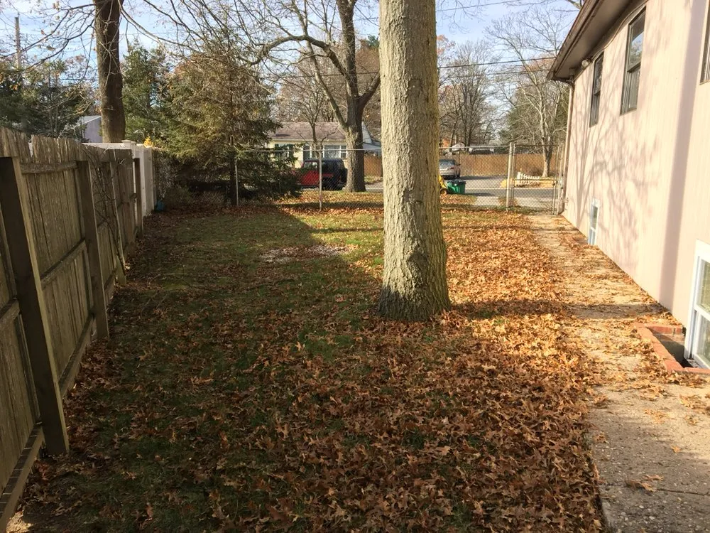 Custom lawn care service for residential properties in Port Jefferson Station, NY by G & E Landscaping