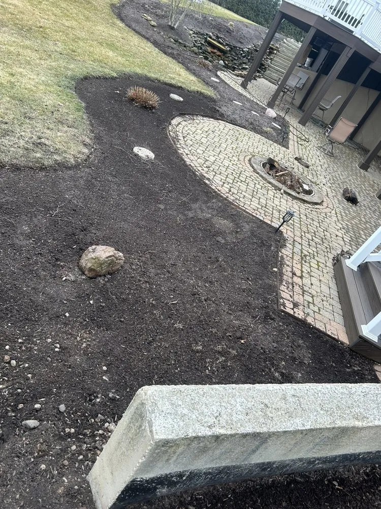 Professional yard maintenance with custom design in New Haven, IN by G And T Seevocw