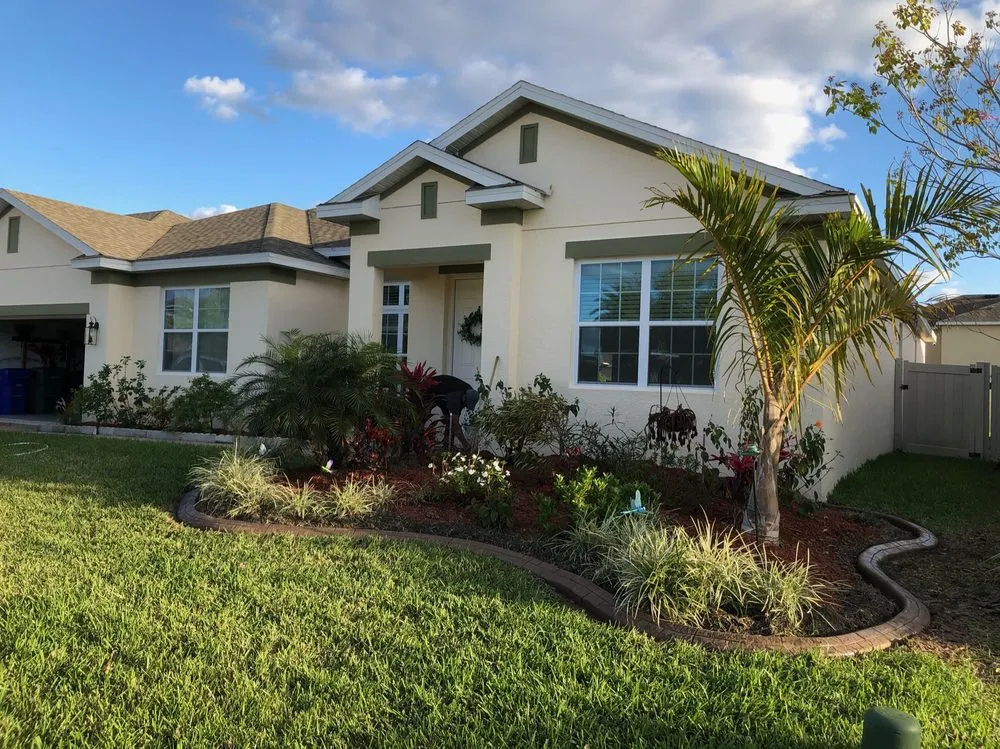 Professional lawn mowing service with custom design in Kissimmee, FL by G7 Curbing