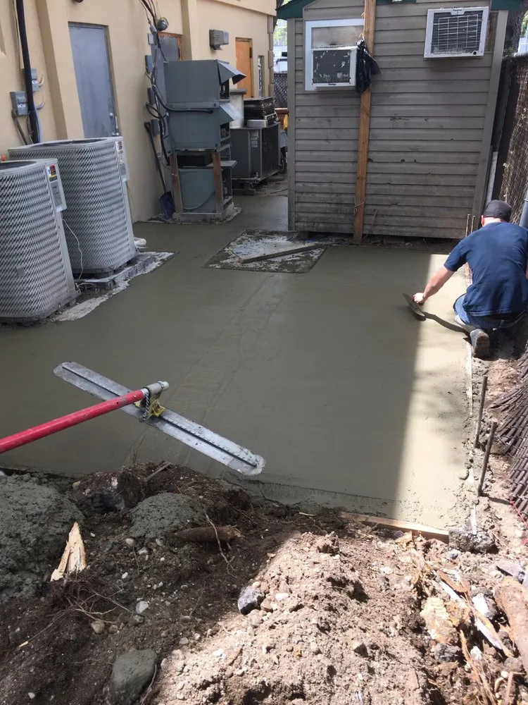 Trusted lawn mowing service for beautiful yards in Commack, NY by Gabriella Concrete