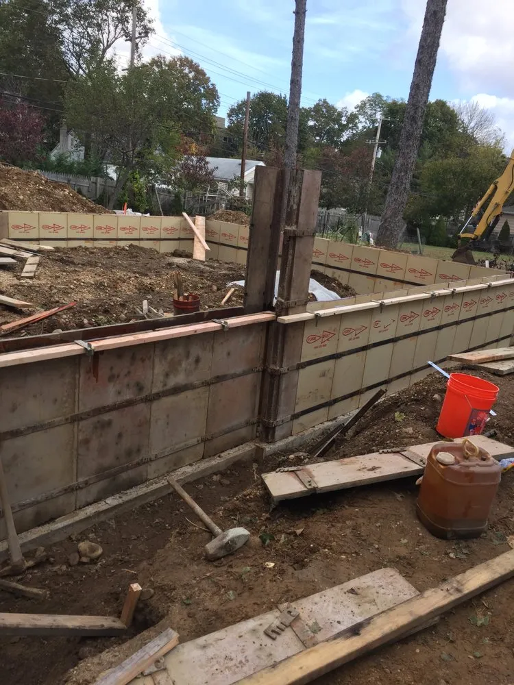 Custom yard cleanup service in Commack, NY by Gabriella Concrete