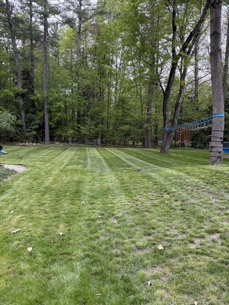 Expert lawn mowing service with custom design in Bedford, NH by Gaffney Property Services