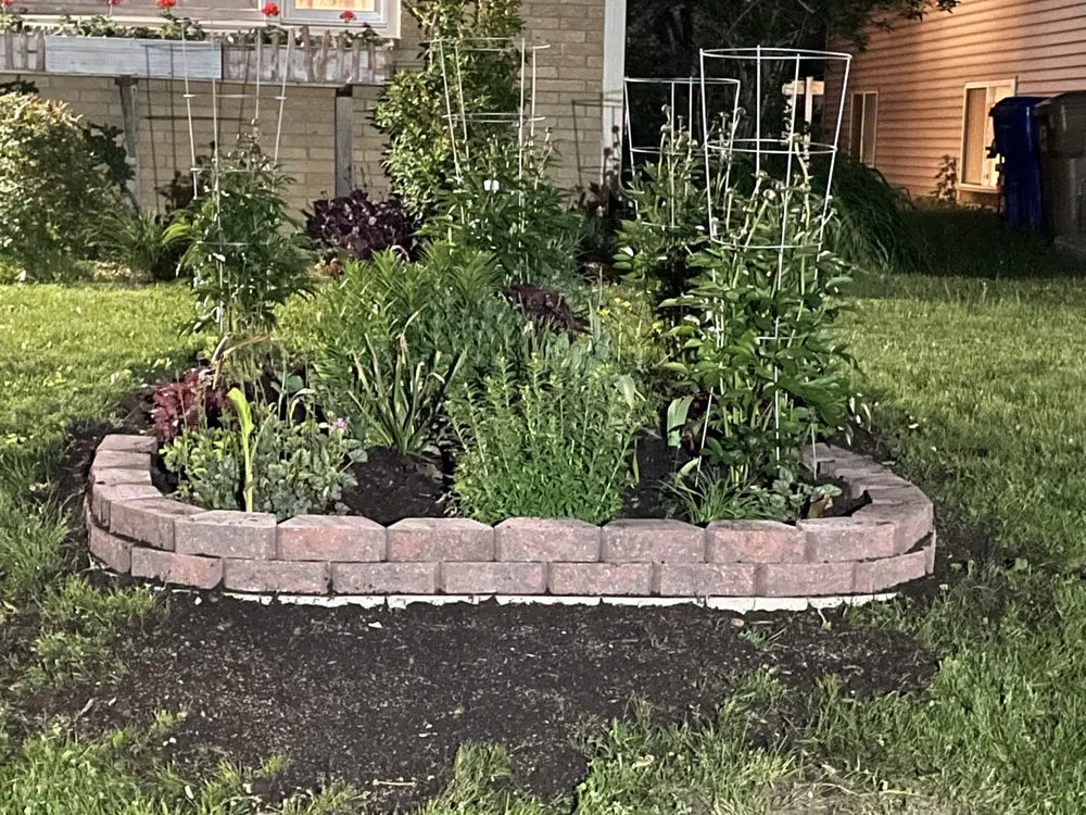 Custom landscape design for year-round maintenance in Kenosha, WI by Garcia Landscaping Services