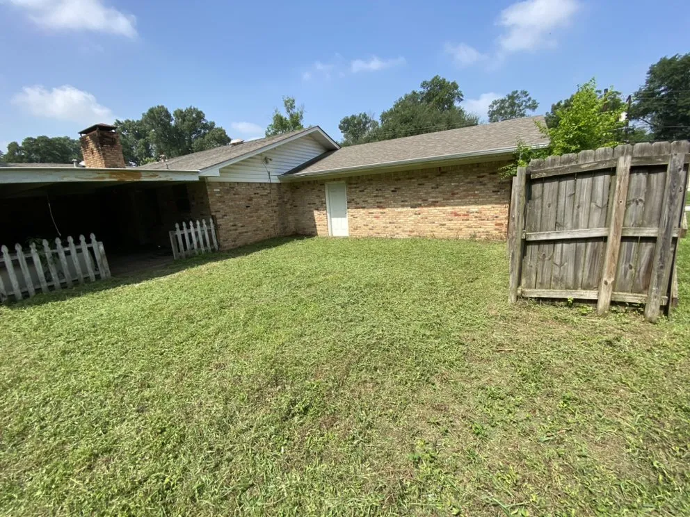 Custom garden landscaping for year-round maintenance in Longview, TX by Garcia Lawn Care Service