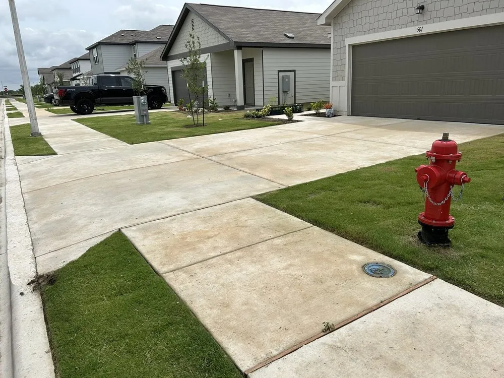Local outdoor landscaping for residential properties in Kyle, TX by Garcia Property Maintenance