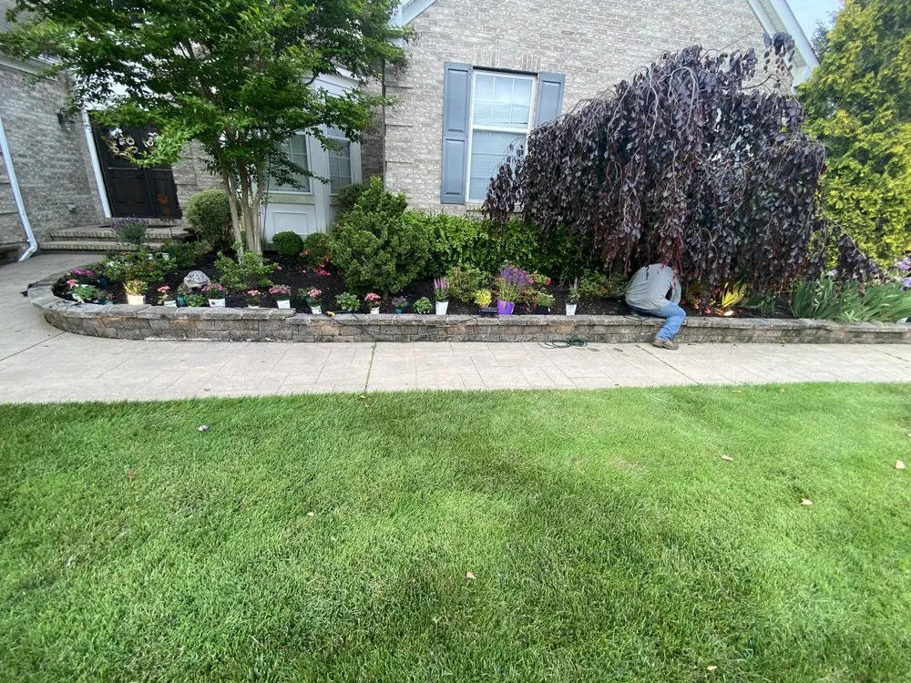 Affordable yard cleanup service for homes in Tinton Falls, NJ by Garcias & Sons Landscaping
