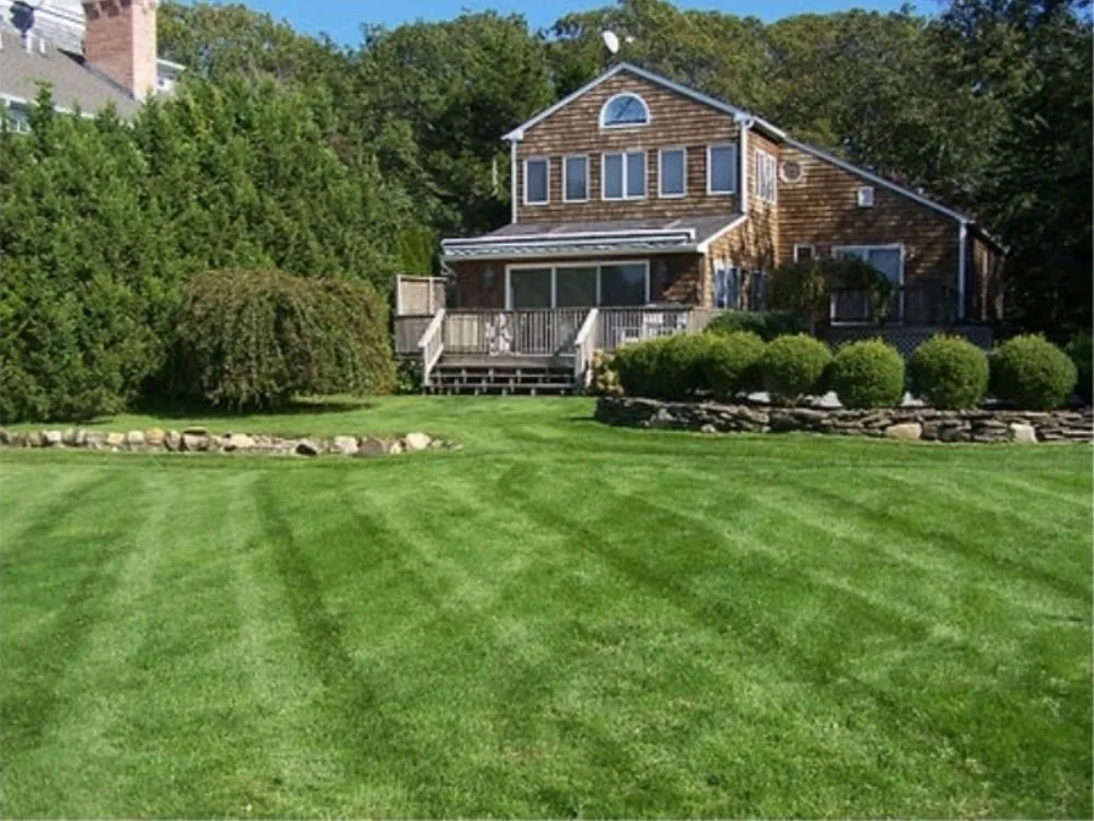 Custom yard maintenance in Brentwood, NY by Garcia's Landscaping