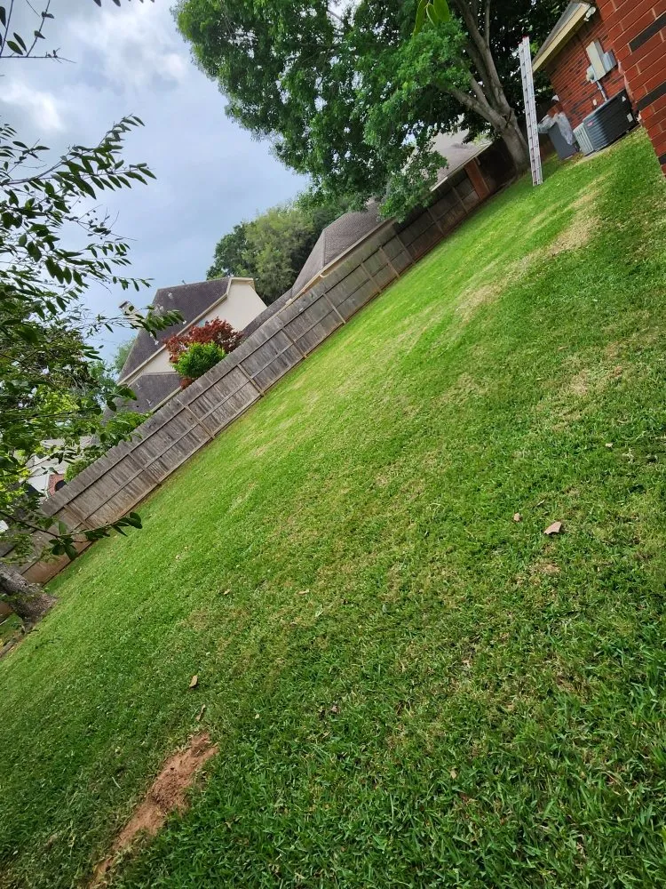 Custom garden landscaping for residential properties in Rosharon, TX by Garcia's Lawn Maintenance Services