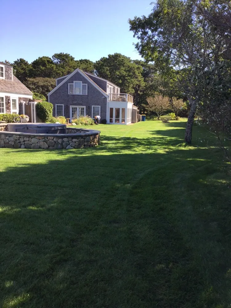 Expert lawn mowing service with custom design across Tisbury, MA - Garden Beautifiers Landscaping