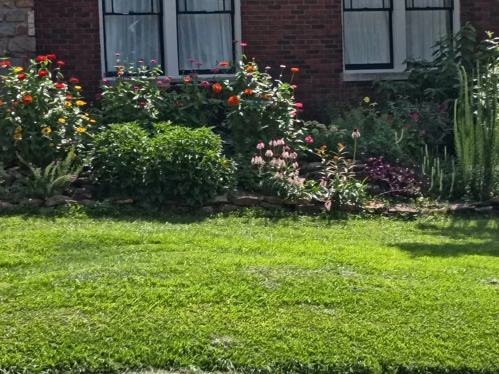 Professional lawn mowing service for outdoor upgrades in Bryant, AR by Garden Designs By R&L