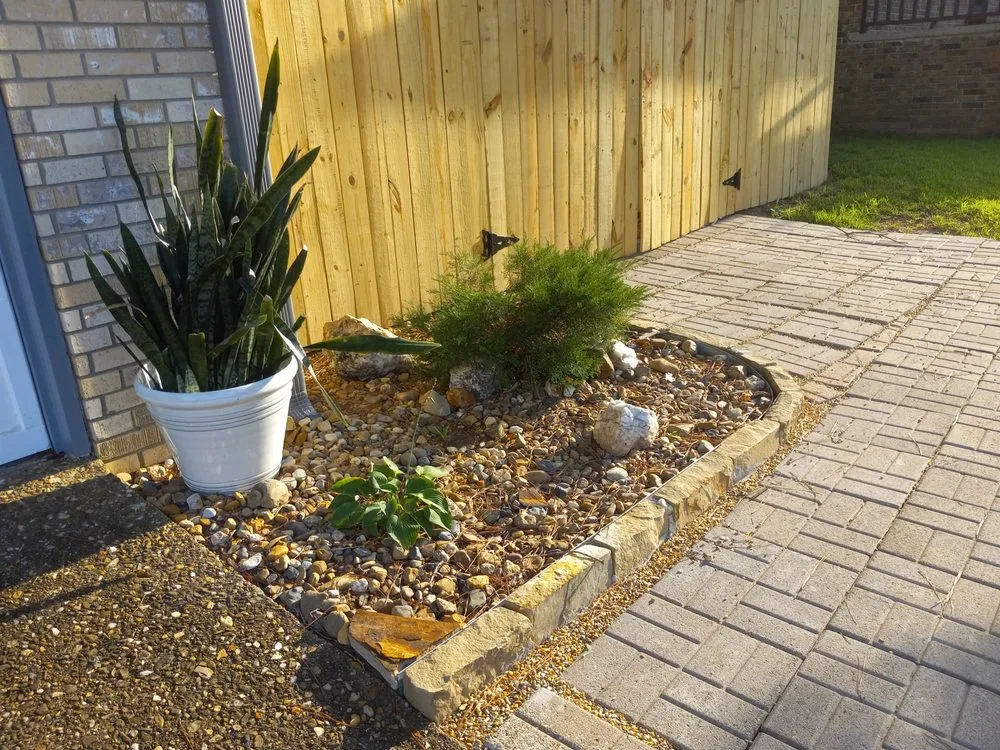 Custom landscape installation for residential properties in Bryant, AR by Garden Designs By R&L