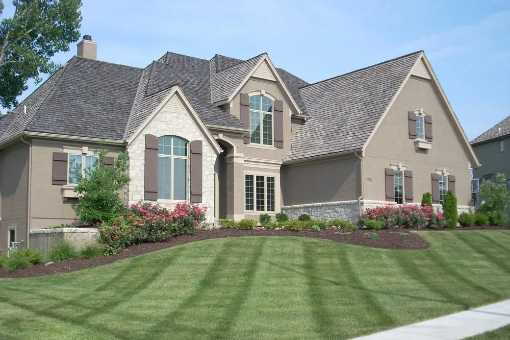Custom lawn care service for residential properties across Raymore, MO - Garden Gate Lawn & Landscape