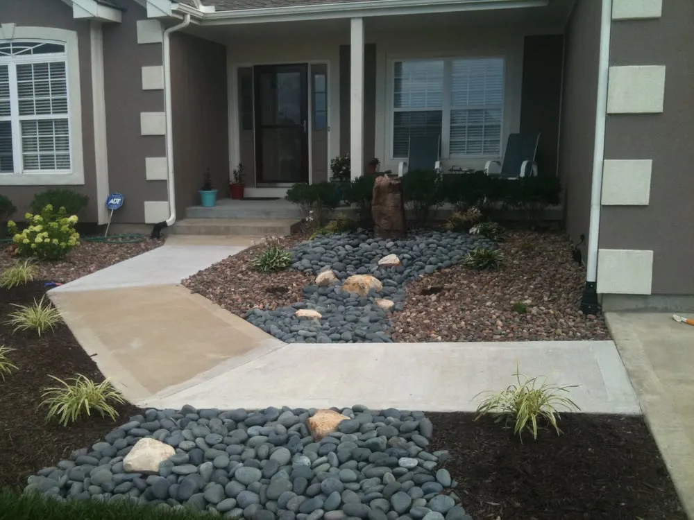 Professional yard cleanup service experts serving Raymore, MO - Garden Gate Lawn & Landscape